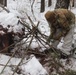 Cold-Weather Operations Course students build improvised shelters, survive outdoors