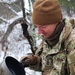 Cold-Weather Operations Course students build improvised shelters, survive outdoors