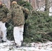 Cold-Weather Operations Course students build improvised shelters, survive outdoors