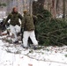 Cold-Weather Operations Course students build improvised shelters, survive outdoors