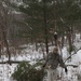 Cold-Weather Operations Course students build improvised shelters, survive outdoors