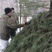 Cold-Weather Operations Course students build improvised shelters, survive outdoors