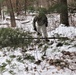 Cold-Weather Operations Course students build improvised shelters, survive outdoors