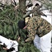 Improvised shelter building by Cold-Weather Operations Course students in Class 20-01
