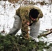 Improvised shelter building by Cold-Weather Operations Course students in Class 20-01