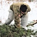 Improvised shelter building by Cold-Weather Operations Course students in Class 20-01