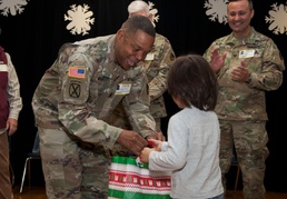 Warm hearts help keep students warm at annual 502nd FSG coat drive