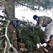 Improvised shelter building by Cold-Weather Operations Course students in Class 20-01