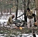 Improvised shelter building by Cold-Weather Operations Course students in Class 20-01