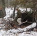 Improvised shelter building by Cold-Weather Operations Course students in Class 20-01