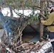 Improvised shelter building by Cold-Weather Operations Course students in Class 20-01