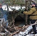 Improvised shelter building by Cold-Weather Operations Course students in Class 20-01