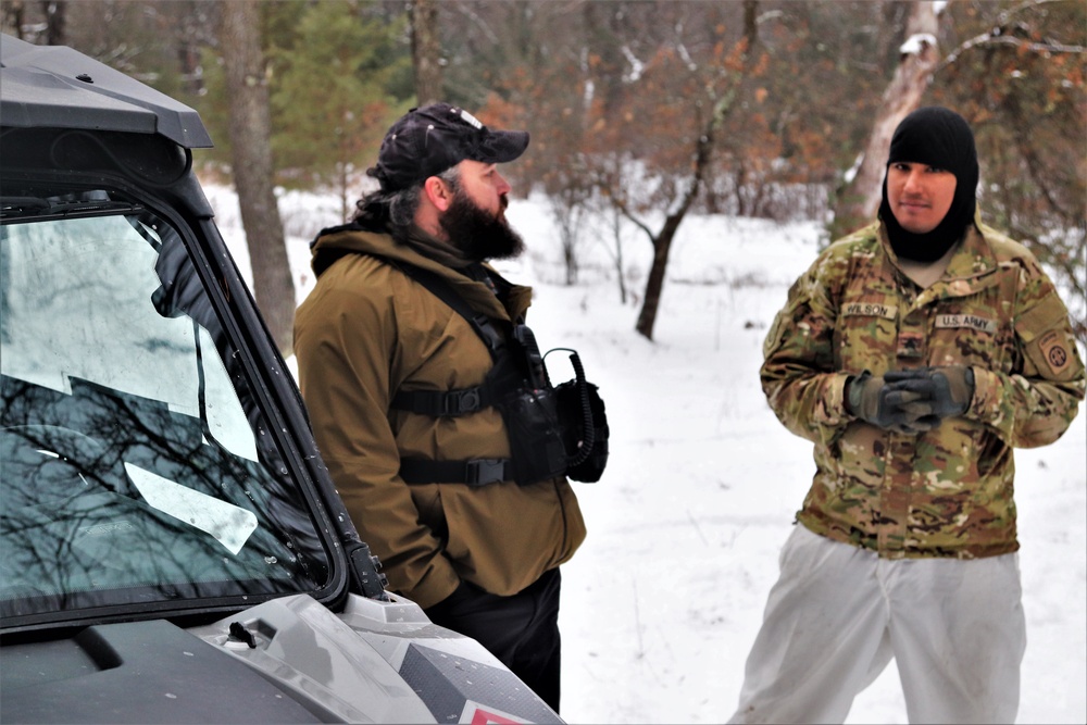 Improvised shelter building by Cold-Weather Operations Course students in Class 20-01