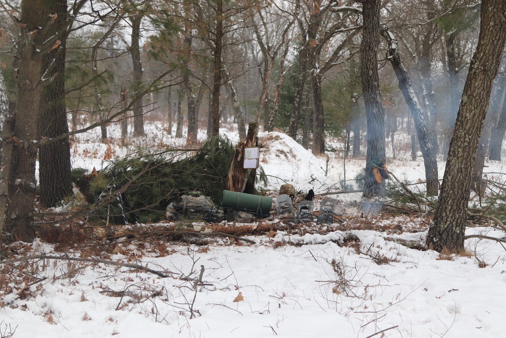 Improvised shelter building by Cold-Weather Operations Course students in Class 20-01