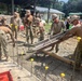 U.S. Navy Seabees deployed with NMCB-5’s Detail Palawan pour concrete at Malatgao Elementary School