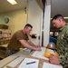 U.S. Navy Seabees deployed with NMCB-5 receive mail during the holidays