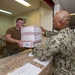 U.S. Navy Seabees deployed with NMCB-5 receive mail during the holidays