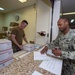 U.S. Navy Seabees deployed with NMCB-5 receive mail during the holidays