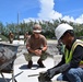 U.S. Navy Seabees from NMCB 5’s Detail Diego Garcia place concrete in support of the U.S. Air Force