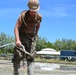 U.S. Navy Seabees from NMCB 5’s Detail Diego Garcia place concrete in support of the U.S. Air Force