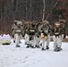 Fort McCoy Cold-Weather Operations Course students train in snowshoes pulling ahkio sled