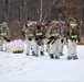 Fort McCoy Cold-Weather Operations Course students train in snowshoes pulling ahkio sled