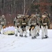 Fort McCoy Cold-Weather Operations Course students train in snowshoes pulling ahkio sled