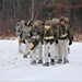 Fort McCoy Cold-Weather Operations Course students train in snowshoes pulling ahkio sled