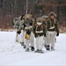 Fort McCoy Cold-Weather Operations Course students train in snowshoes pulling ahkio sled