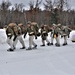 Fort McCoy Cold-Weather Operations Course students train in snowshoes pulling ahkio sled