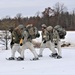 Fort McCoy Cold-Weather Operations Course students train in snowshoes pulling ahkio sled