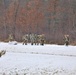 Fort McCoy Cold-Weather Operations Course students train in snowshoes pulling ahkio sled