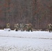 Fort McCoy Cold-Weather Operations Course students train in snowshoes pulling ahkio sled