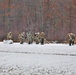 Fort McCoy Cold-Weather Operations Course students train in snowshoes pulling ahkio sled