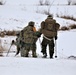 Fort McCoy Cold-Weather Operations Course students train in snowshoes pulling ahkio sled