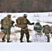 Fort McCoy Cold-Weather Operations Course students train in snowshoes pulling ahkio sled