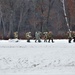 Fort McCoy Cold-Weather Operations Course students train in snowshoes pulling ahkio sled