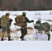 Fort McCoy Cold-Weather Operations Course students train in snowshoes pulling ahkio sled