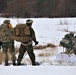 Fort McCoy Cold-Weather Operations Course students train in snowshoes pulling ahkio sled