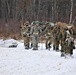 Fort McCoy Cold-Weather Operations Course students train in snowshoes pulling ahkio sled