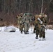 Fort McCoy Cold-Weather Operations Course students train in snowshoes pulling ahkio sled