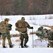 Fort McCoy Cold-Weather Operations Course students train in snowshoes pulling ahkio sled