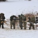 Fort McCoy Cold-Weather Operations Course students train in snowshoes pulling ahkio sled