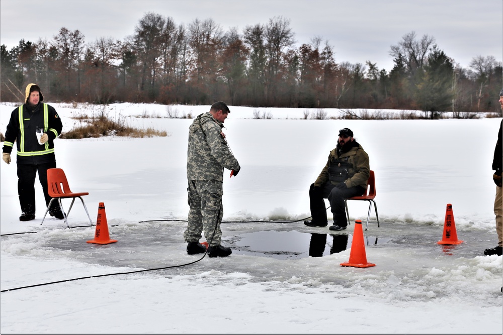 Cold-Weather Operations Course students participate in cold-water immersion training