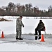 Cold-Weather Operations Course students participate in cold-water immersion training