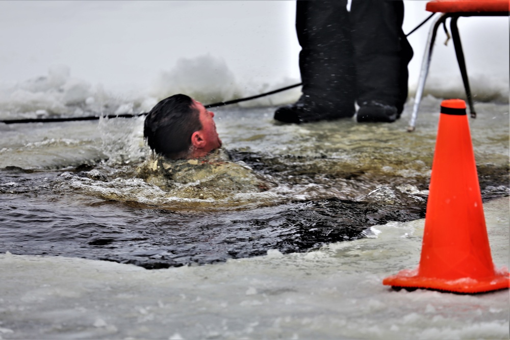 Cold-Weather Operations Course students participate in cold-water immersion training