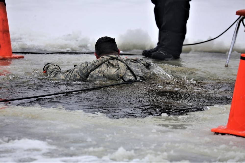 Cold-Weather Operations Course students participate in cold-water immersion training