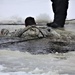 Cold-Weather Operations Course students participate in cold-water immersion training