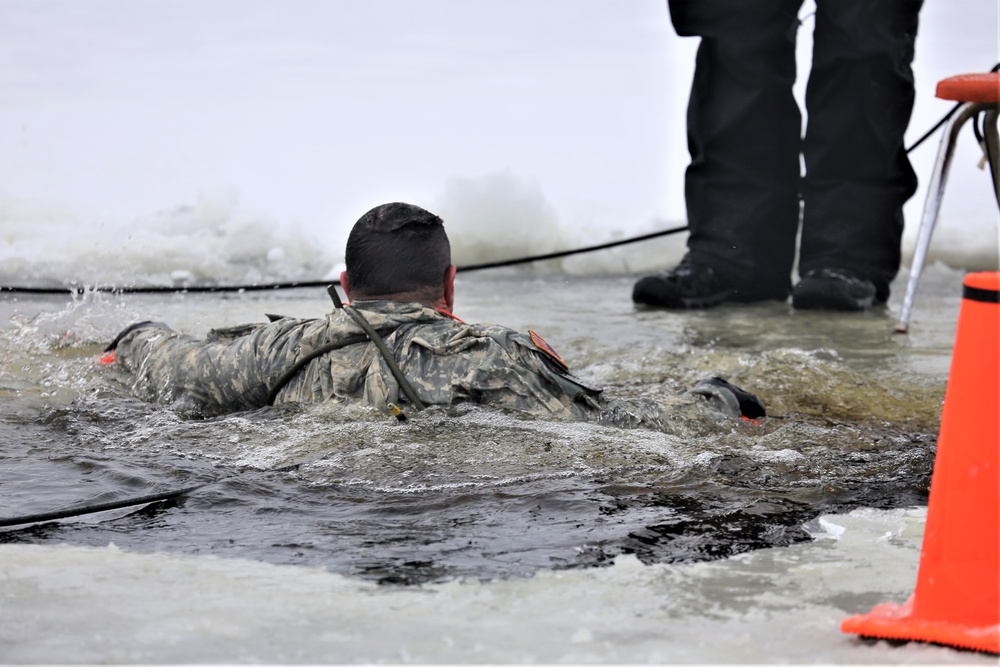 Cold-Weather Operations Course students participate in cold-water immersion training