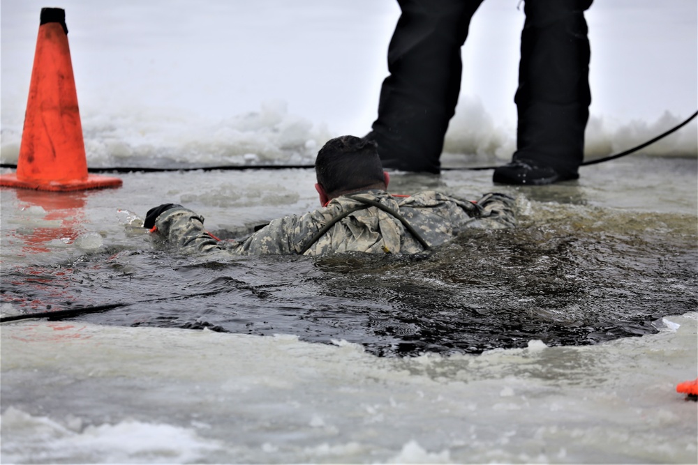 Cold-Weather Operations Course students participate in cold-water immersion training